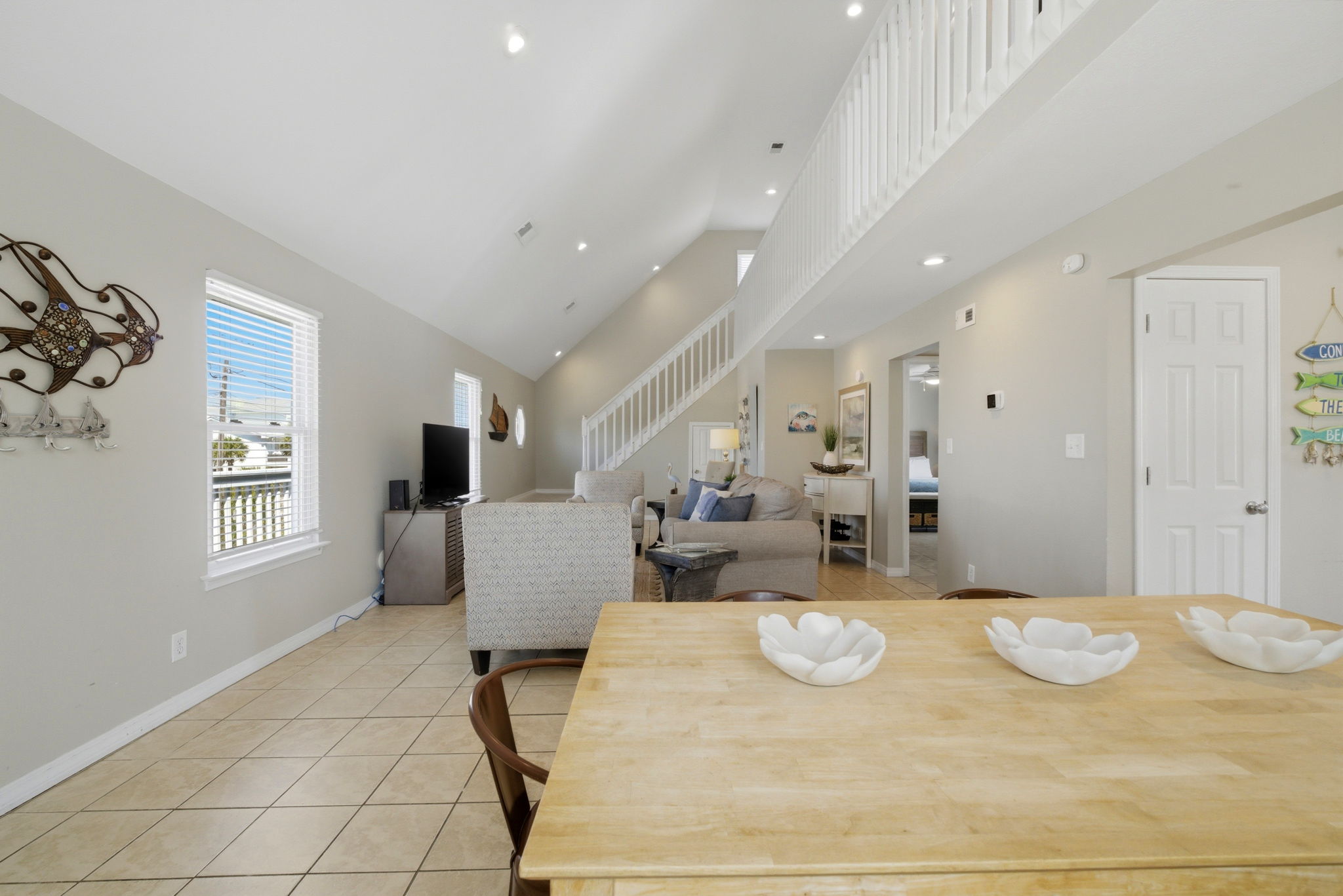 Dining and living room seating area at Beach Blessings