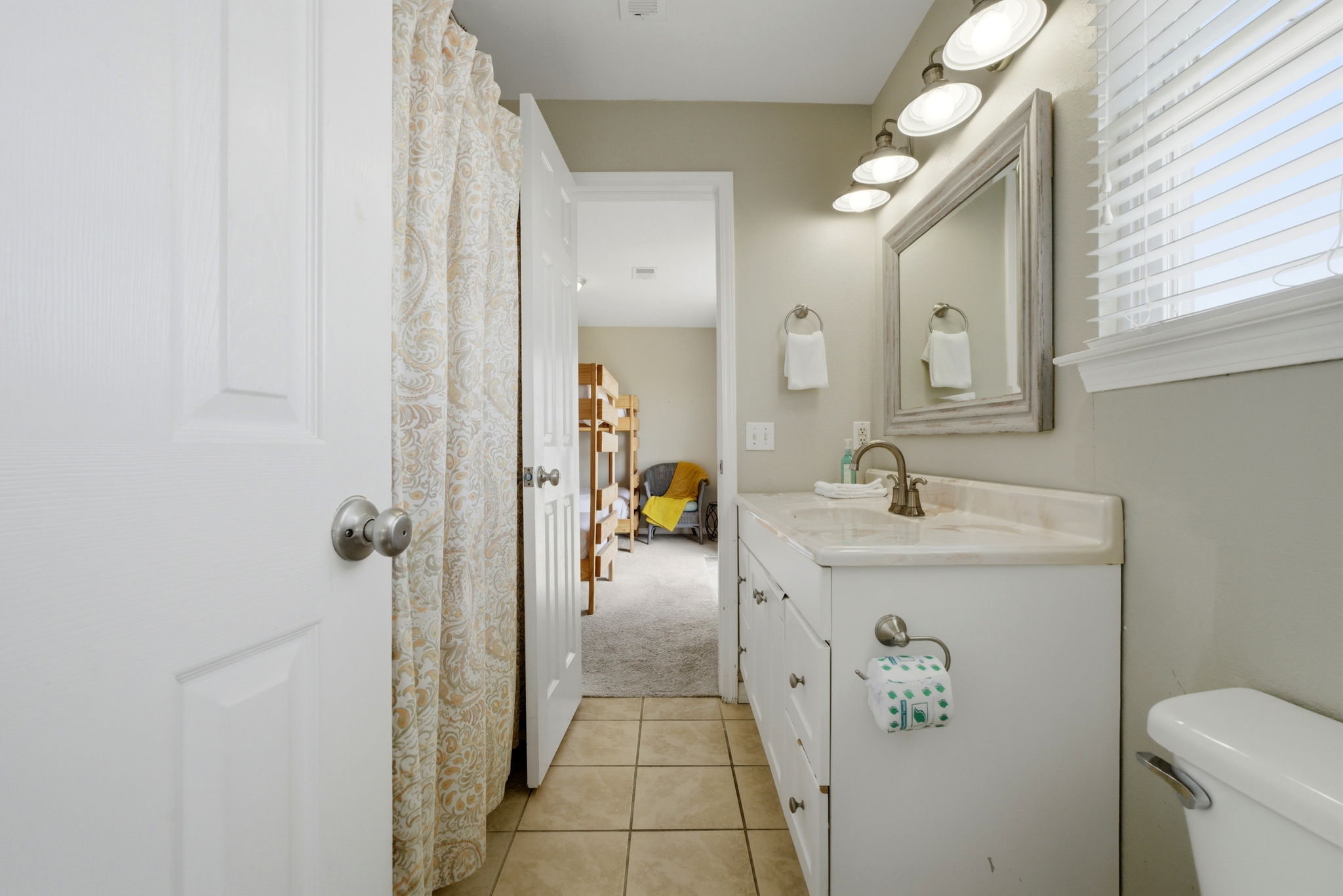 Alternate view of the upstairs Jack and Jill bathroom at Beach Blessings